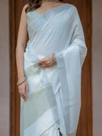 Pure White & Olive Green Handloom Cotton Saree with Minimal Striped Border & Tassel Detailing