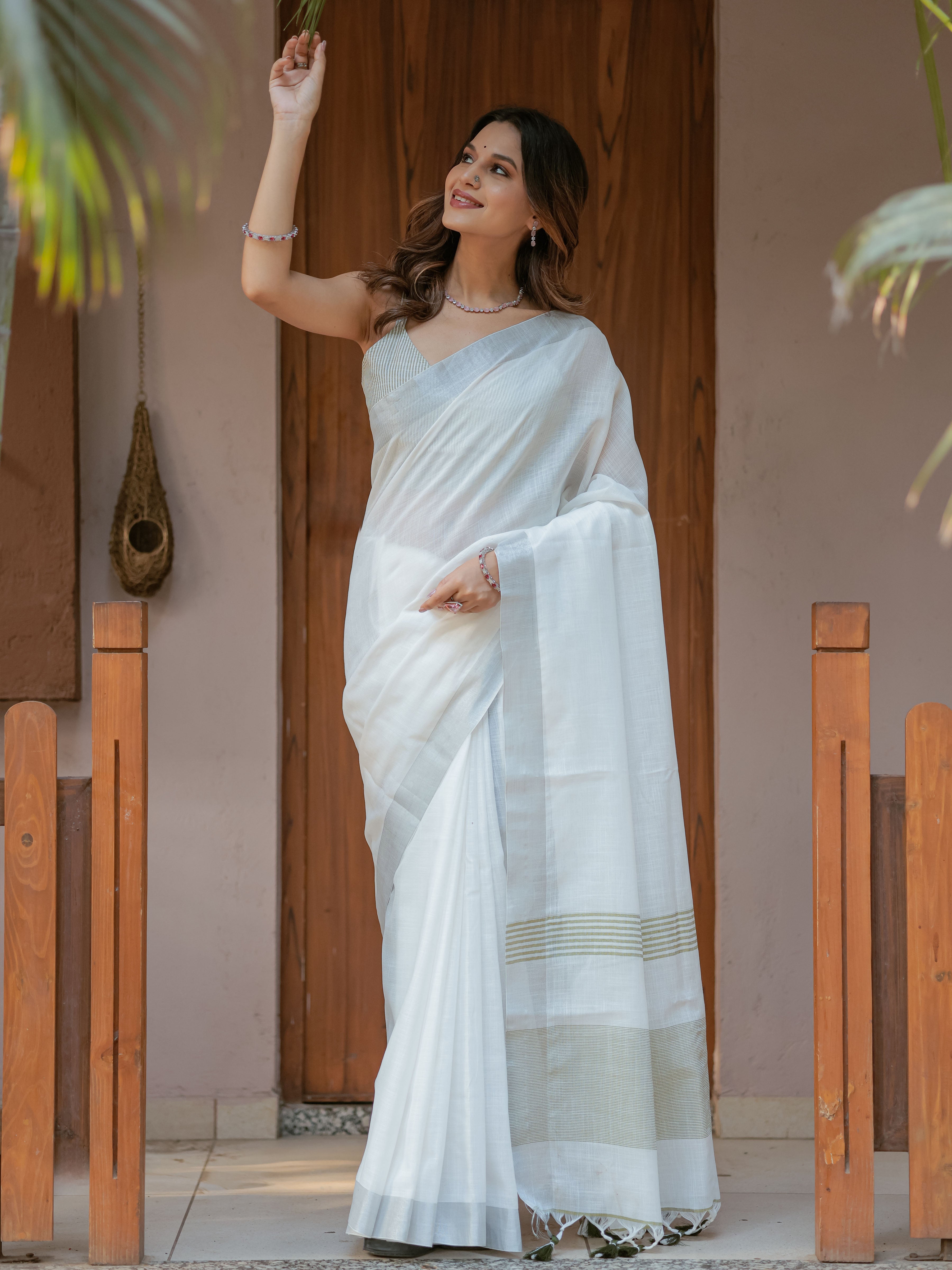 Pure White & Olive Green Handloom Cotton Saree with Minimal Striped Border & Tassel Detailing
