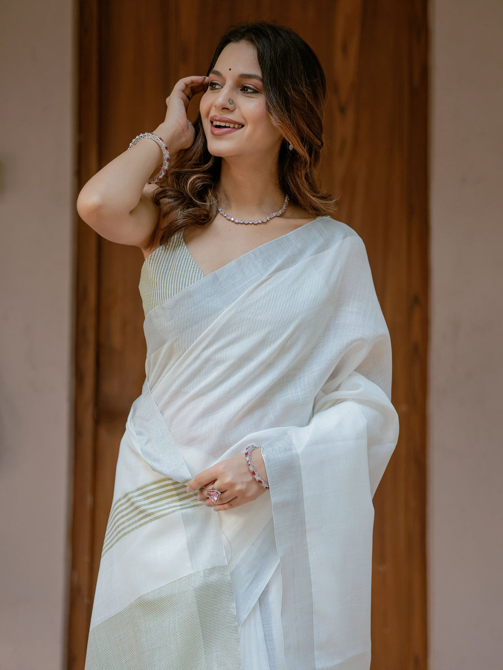 Pure White & Olive Green Handloom Cotton Saree with Minimal Striped Border & Tassel Detailing