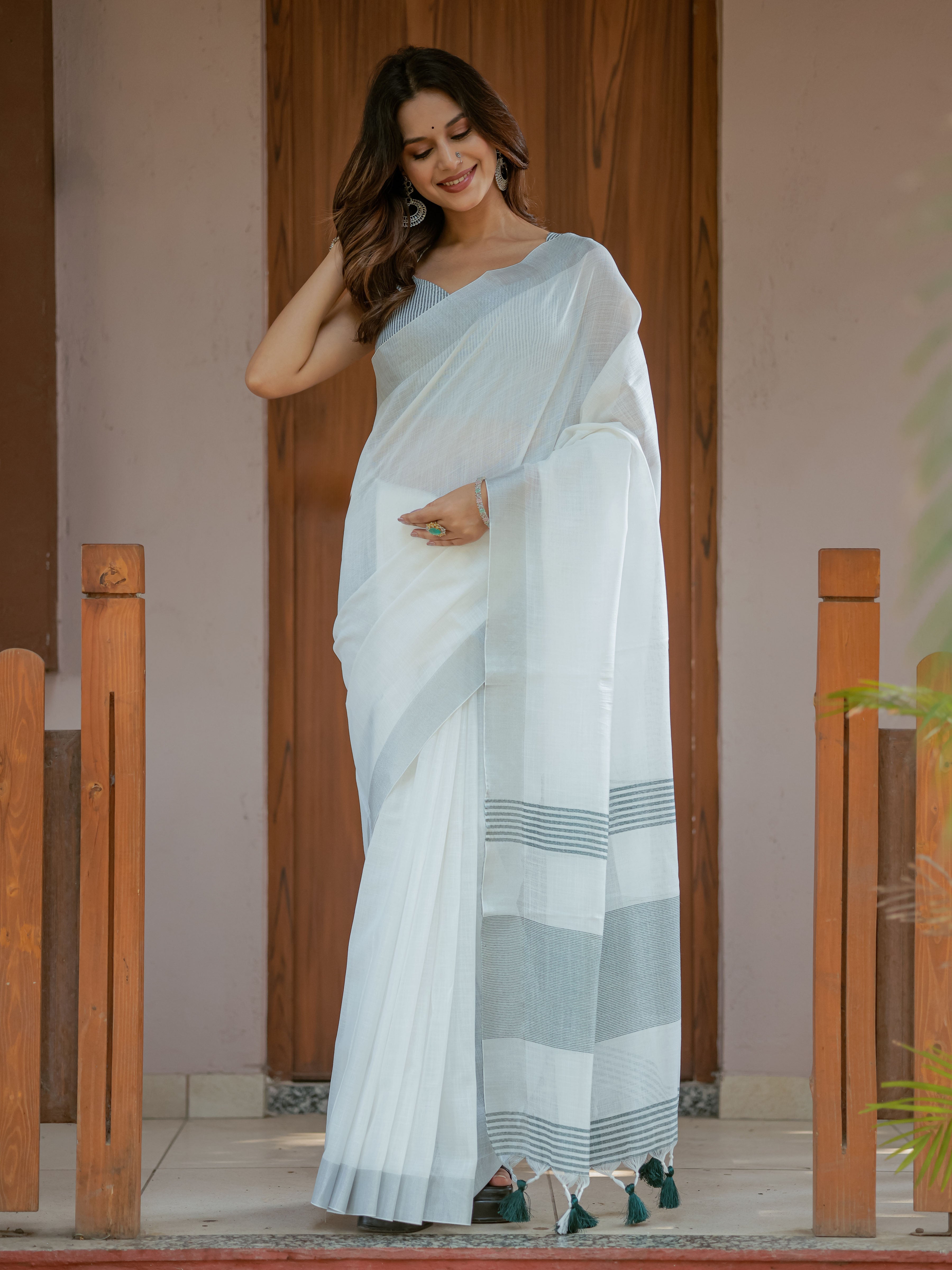 Pure White & Teal Blue Handloom Cotton Saree with Minimal Striped Border & Tassel Detailing