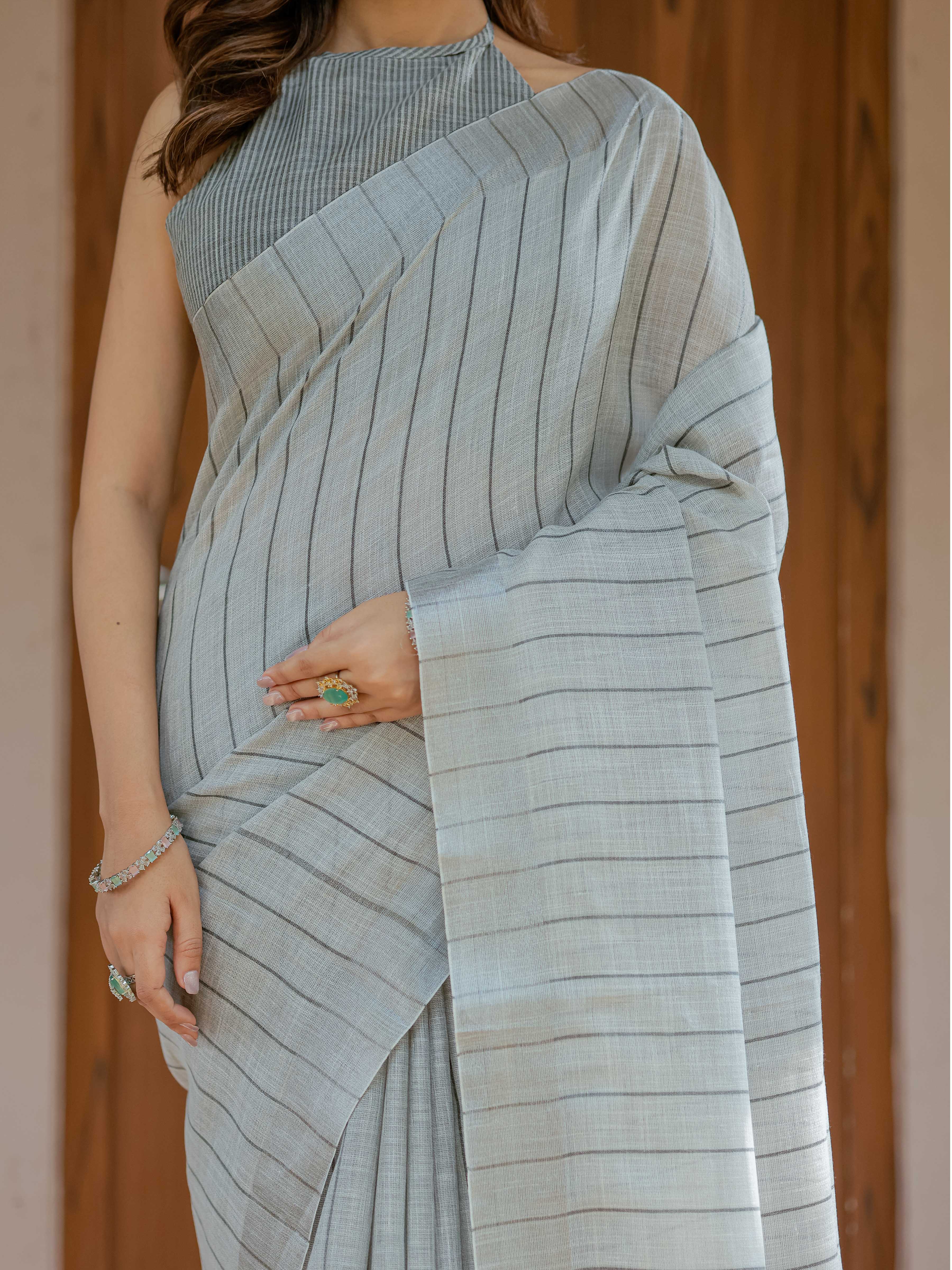Elegant Ash Grey Handloom Cotton Saree with Minimal Striped Weaving & Tassel Detailing