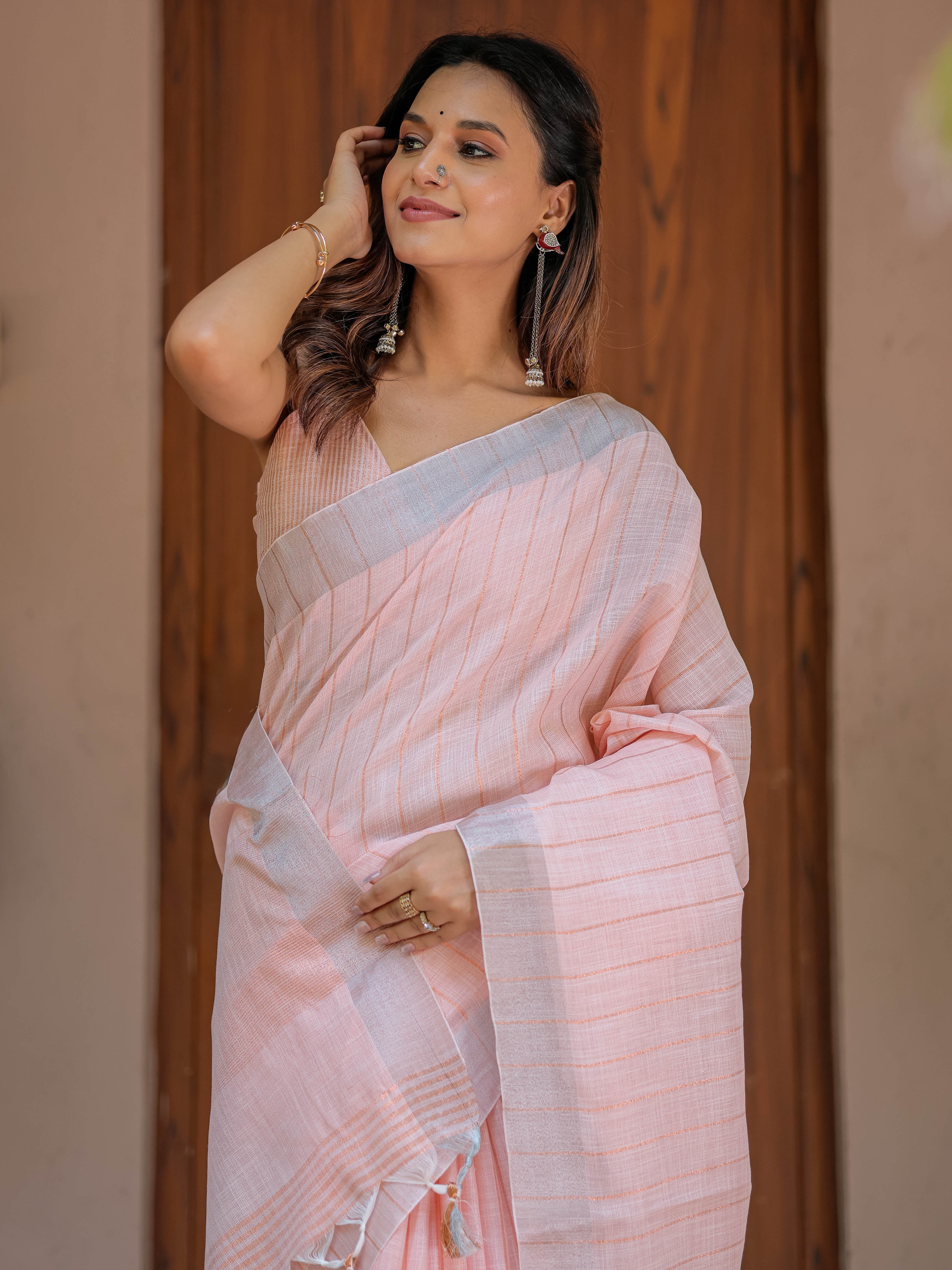 Soft Baby Pink Handloom Cotton Saree with Silver Border & Tassel Detailing