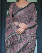 Black Pure Cotton Linen Saree with Pink Striped Pallu and Tassel Accents