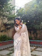 Elegant Off-White Pure Linen Digital Printed Saree with Striped Design and Unique Black Motif Pallu – Comes with Blouse Piece and Tassels