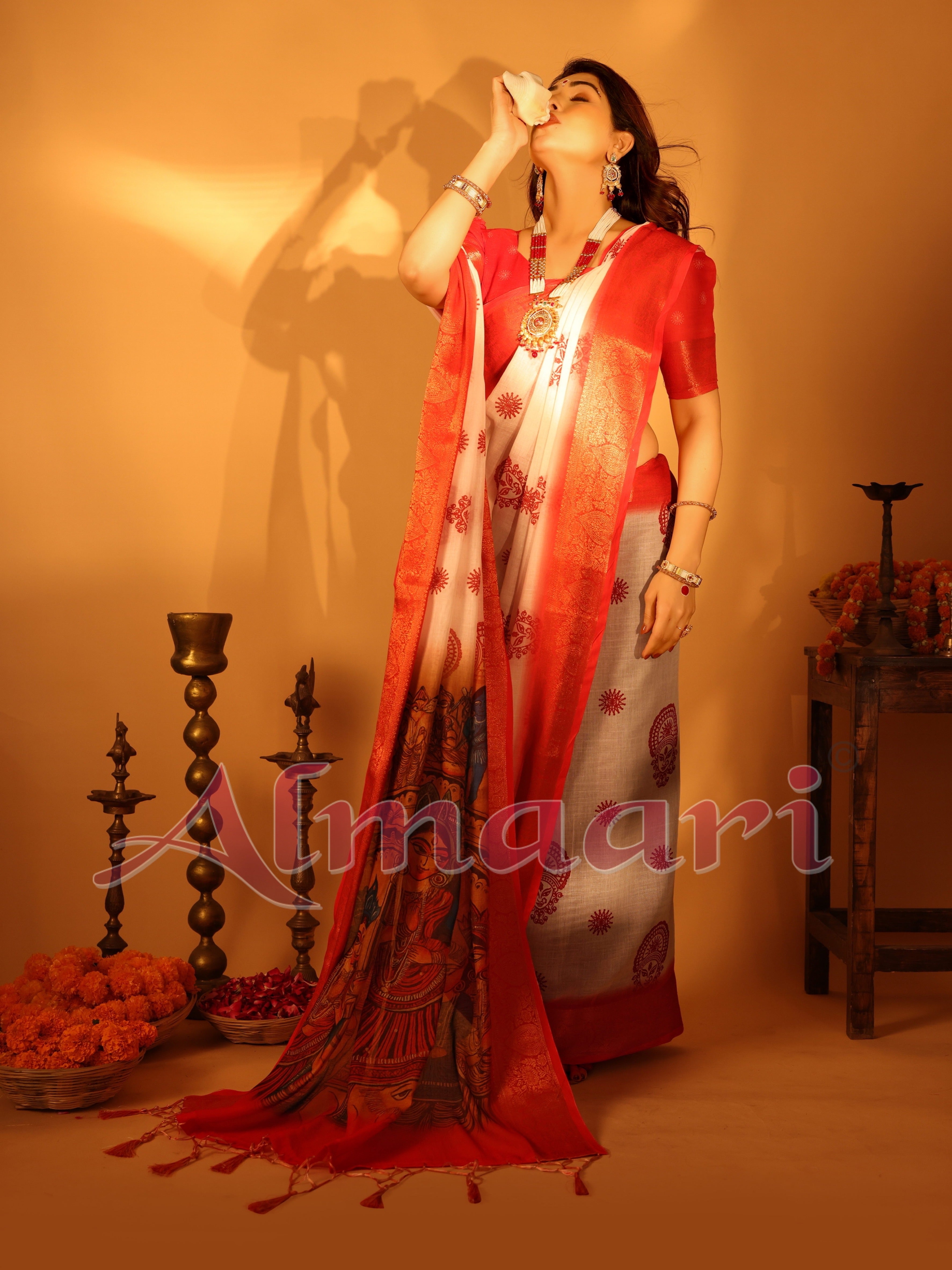 White & Red Handloom Linen Saree with Durga Panchami Art Pallu & Temple Festive Motifs | Zari Border & Tassel Finish