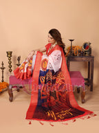 White & Crimson Red Handloom Linen Saree with Kali Maa Digital Artwork Pallu & Zari Border | Durga Puja Special Drape with Tassels