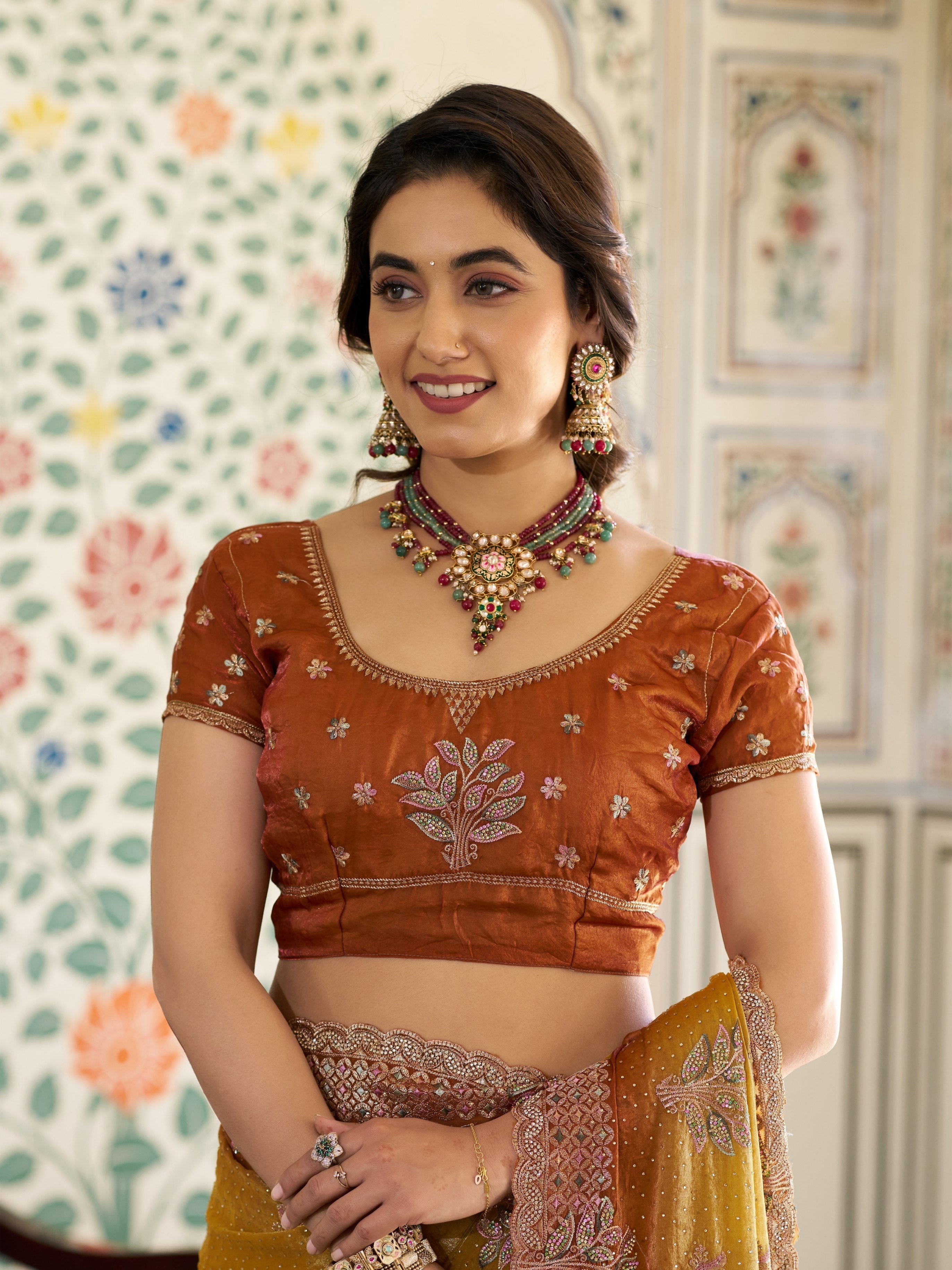 Dual Tone Mustard Yellow & Rust Fendy Satin Embroidered Saree with Floral Motifs & Zari Border | Designer Festive Saree with Tassels & Heavy Embroidered Blouse
