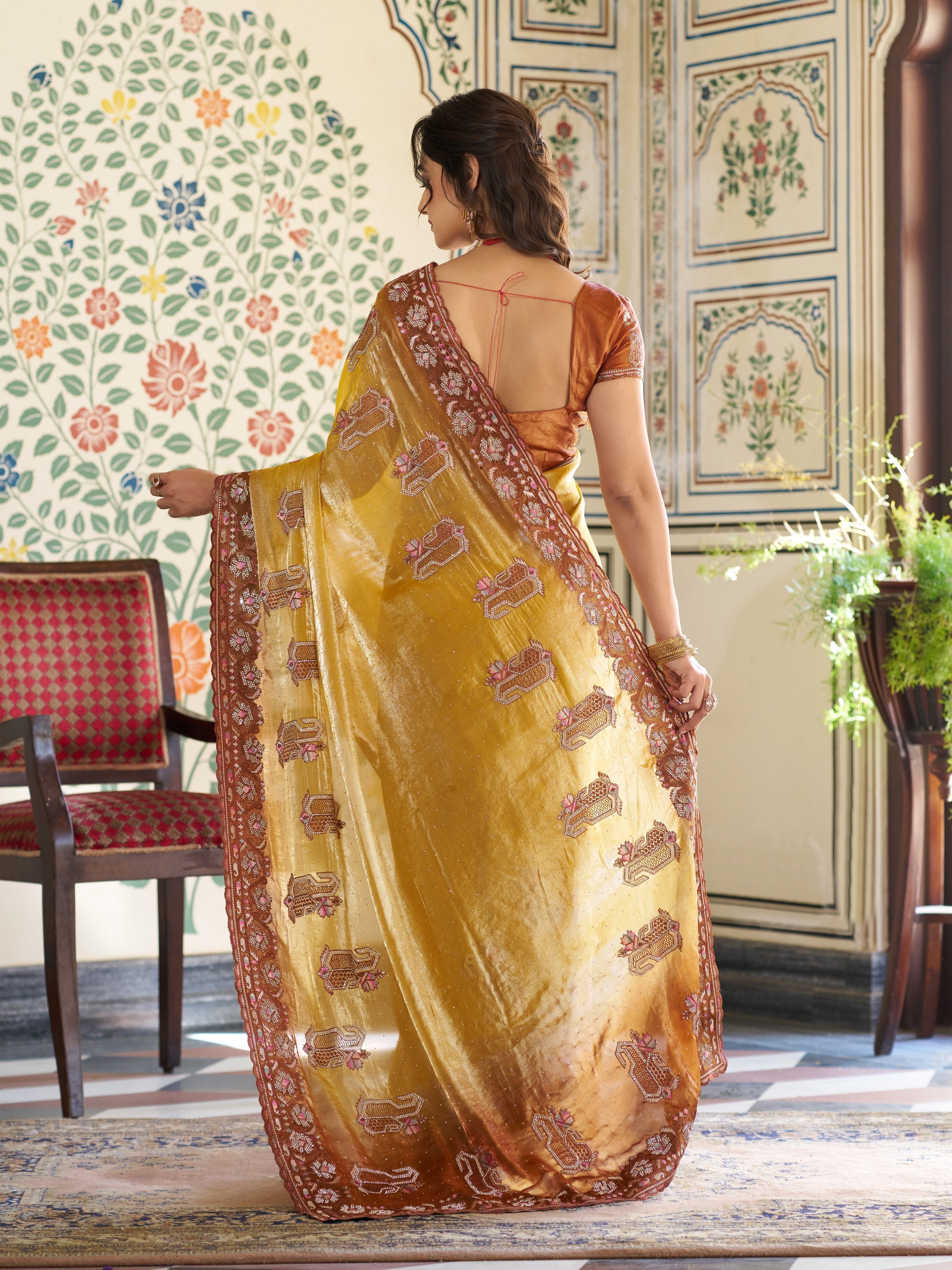 Mustard Yellow Fendy Satin Embroidered Saree with Ethnic Elephant Motifs & Contrast Zari Border | Designer Saree with Tassels & Heavy Embroidered Blouse