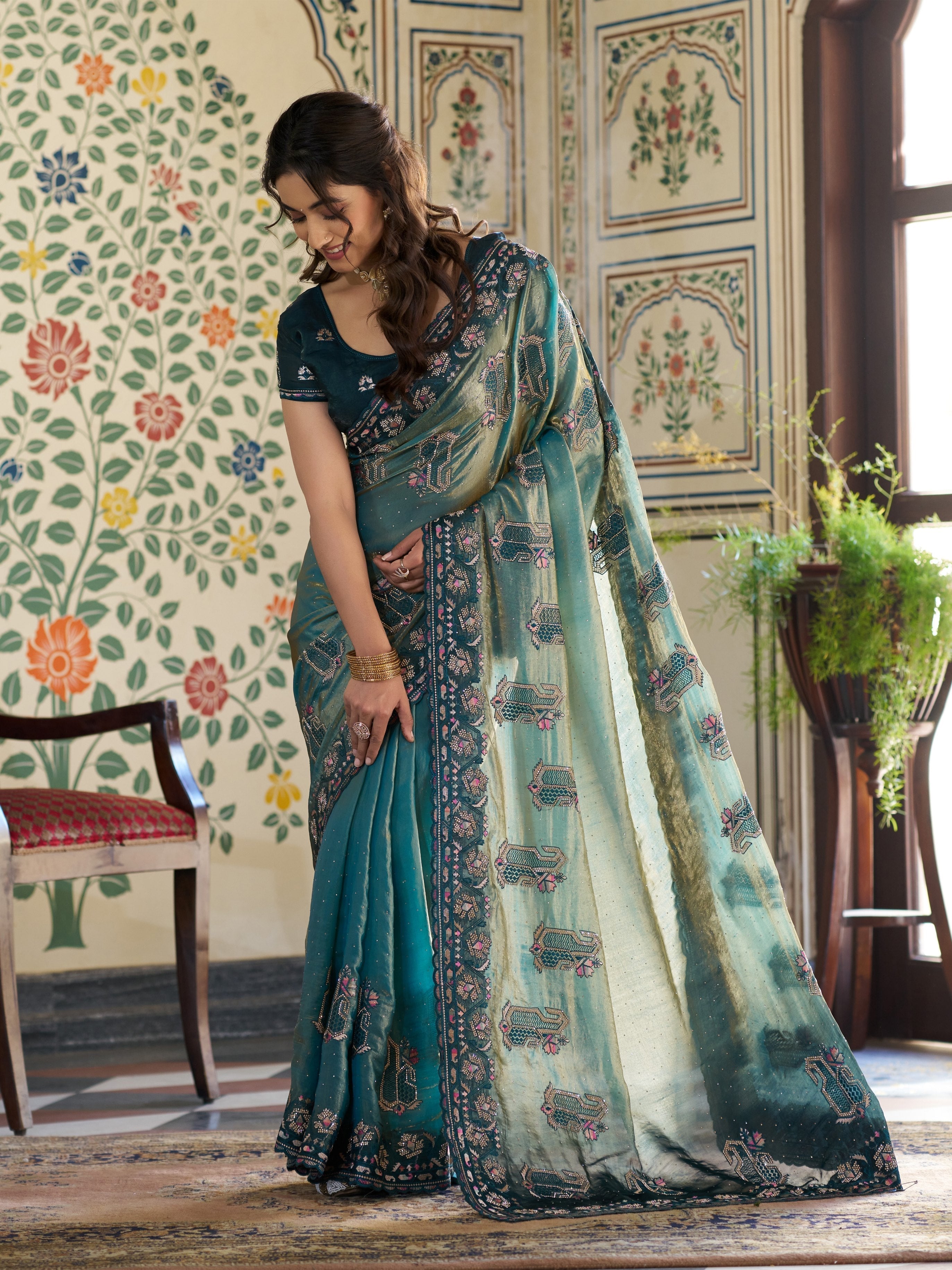 Teal Blue Fendy Satin Embroidered Saree with Ethnic Elephant Motifs & Zari Border | Designer Saree with Tassels & Heavy Embroidered Blouse