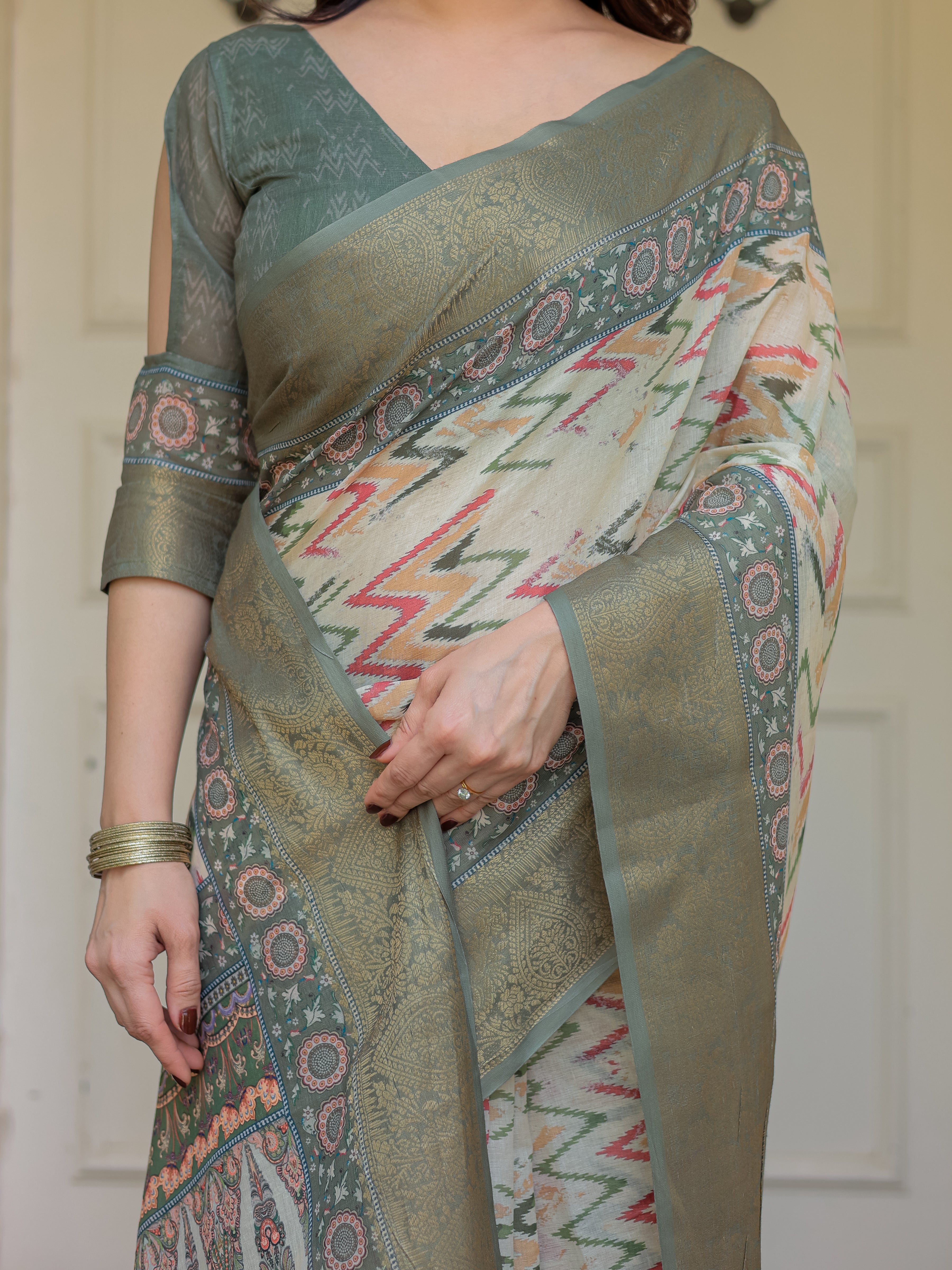 Olive Green Ikat & Ethnic Printed Handloom Cotton Saree with Rich Zari Border & Traditional Pallu