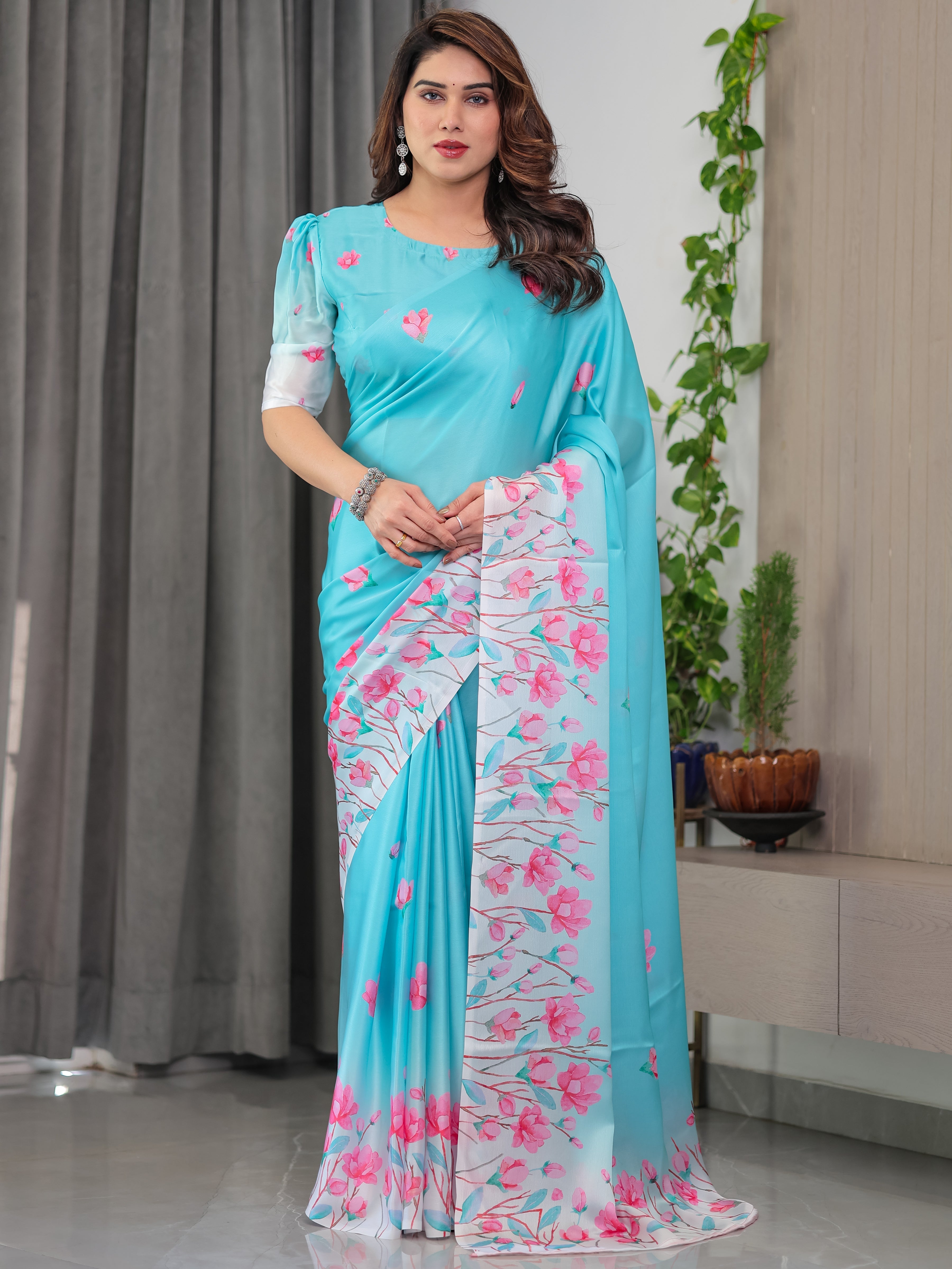 Aqua Blue Satin Georgette Pink Floral Printed Saree with Attached Blouse – Soft Pastel Designer Saree for Elegant & Festive Wear