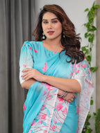 Aqua Blue Satin Georgette Pink Floral Printed Saree with Attached Blouse – Soft Pastel Designer Saree for Elegant & Festive Wear