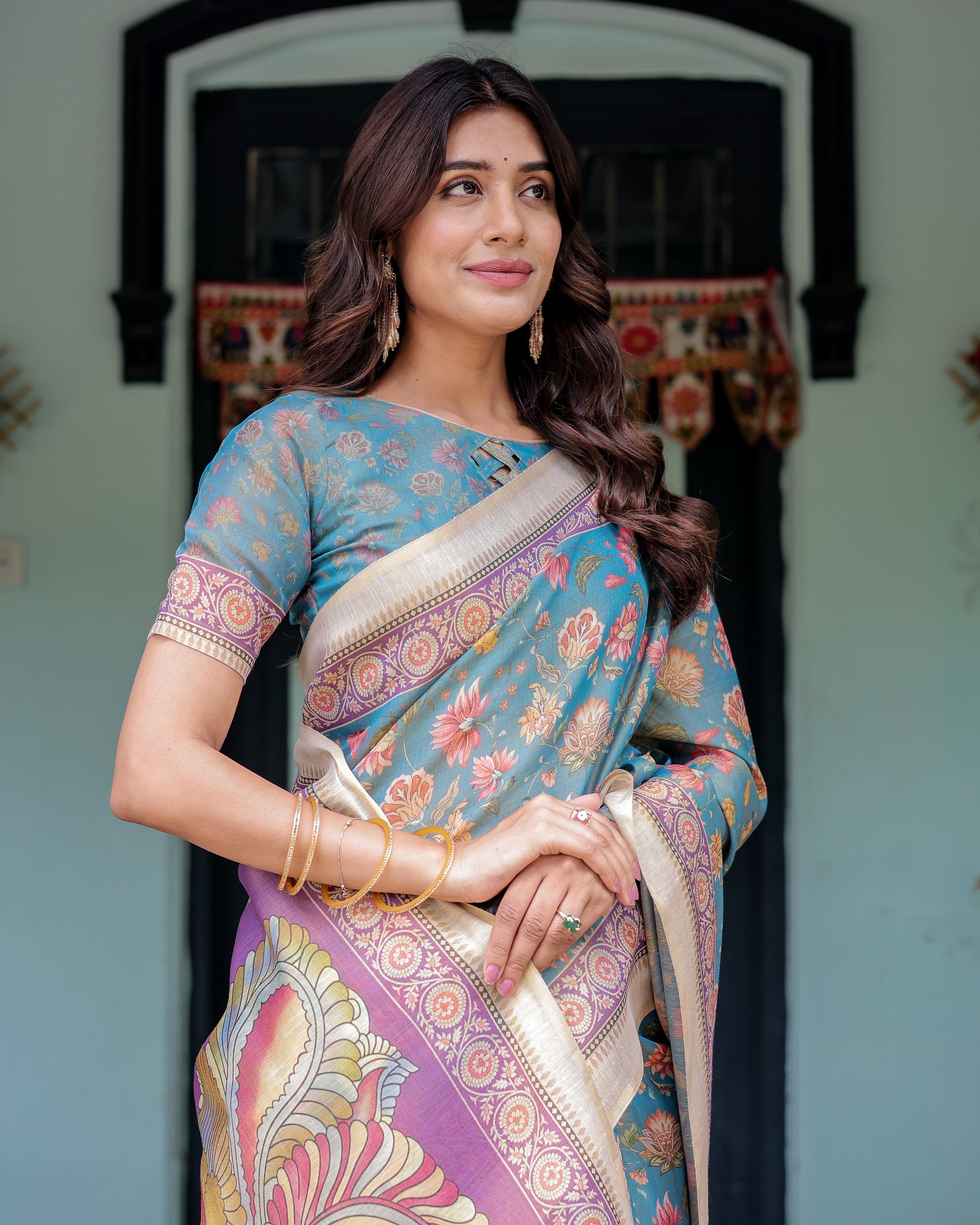 Aqua Blue Handloom Cotton Saree with Multicolor Floral Print & Royal Simha-Pakshi Pallu