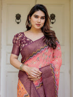 Peach Coral & Maroon Handloom Cotton Floral Printed Saree with Zari Border & Tassels – Festive Traditional Wear