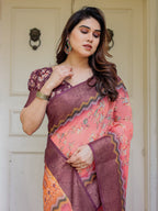 Peach Coral & Maroon Handloom Cotton Floral Printed Saree with Zari Border & Tassels – Festive Traditional Wear