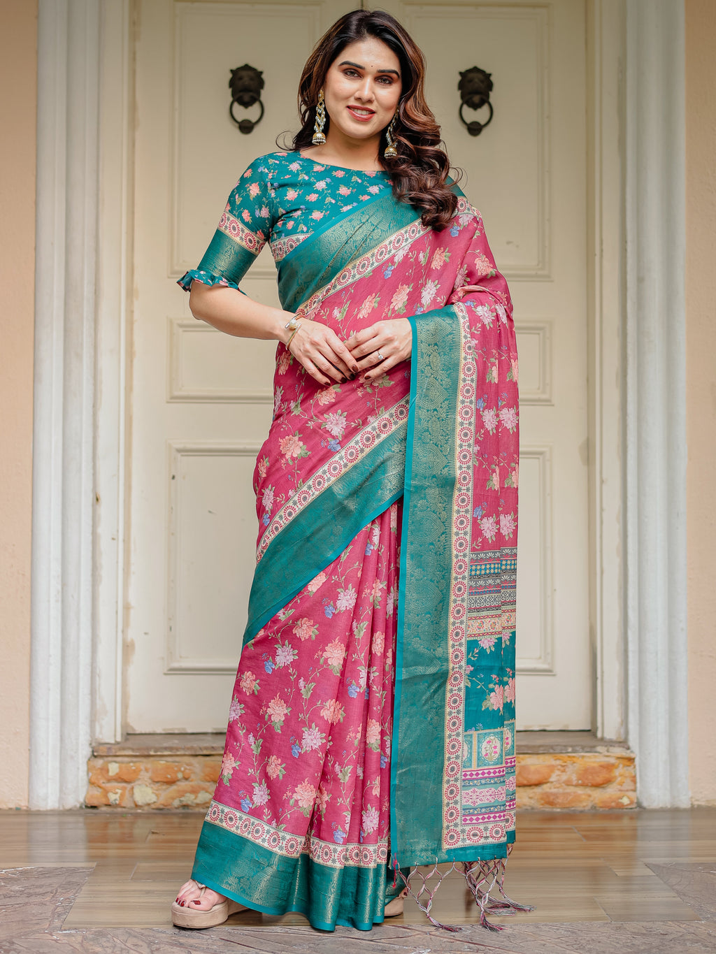 Rani Pink & Teal Green Floral Printed Saree with Rich Zari Border & Tassels – Festive Traditional Wear