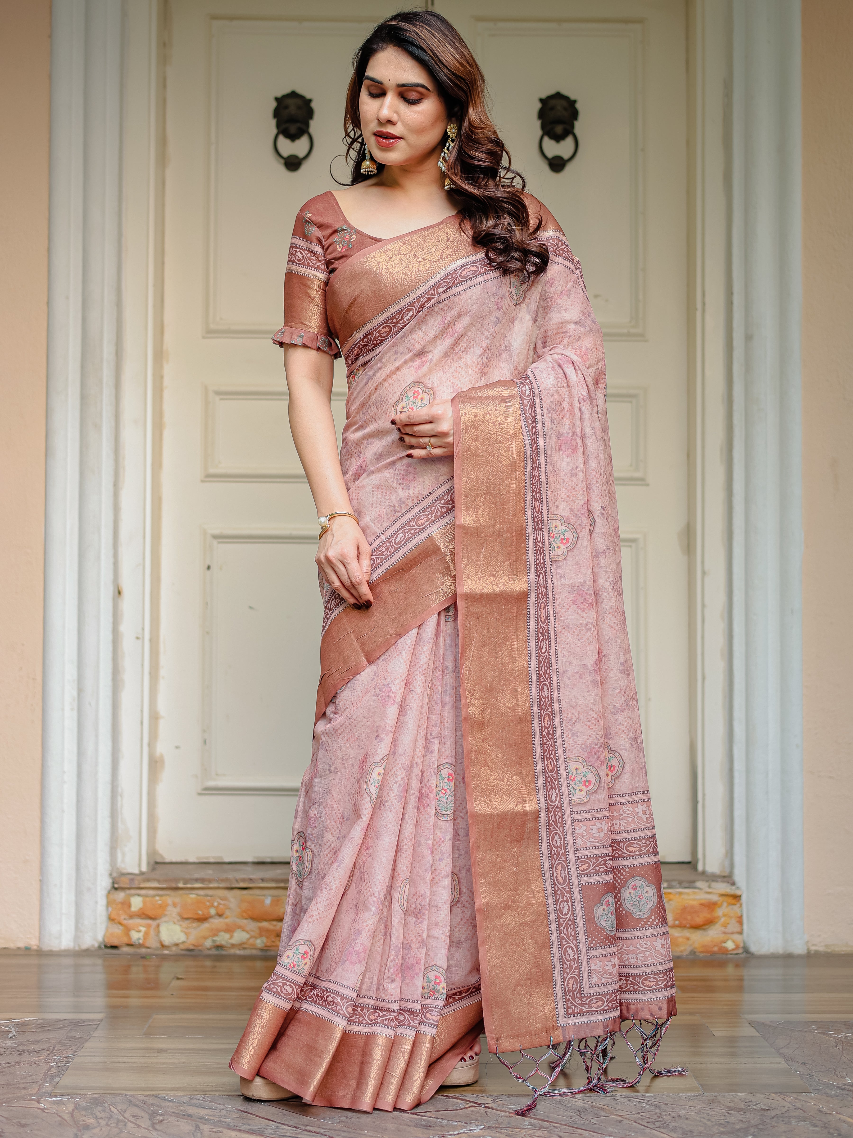 Dusty Peach & Copper Zari Woven Saree with Pastel Motifs & Tassels – Elegant Festive Traditional Wear