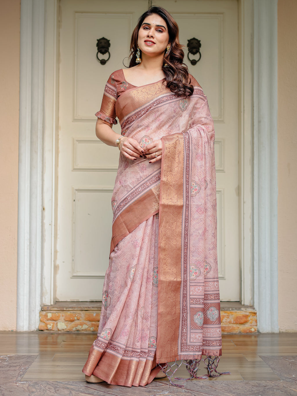 Dusty Peach & Copper Zari Woven Saree with Pastel Motifs & Tassels – Elegant Festive Traditional Wear