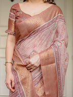 Dusty Peach & Copper Zari Woven Saree with Pastel Motifs & Tassels – Elegant Festive Traditional Wear