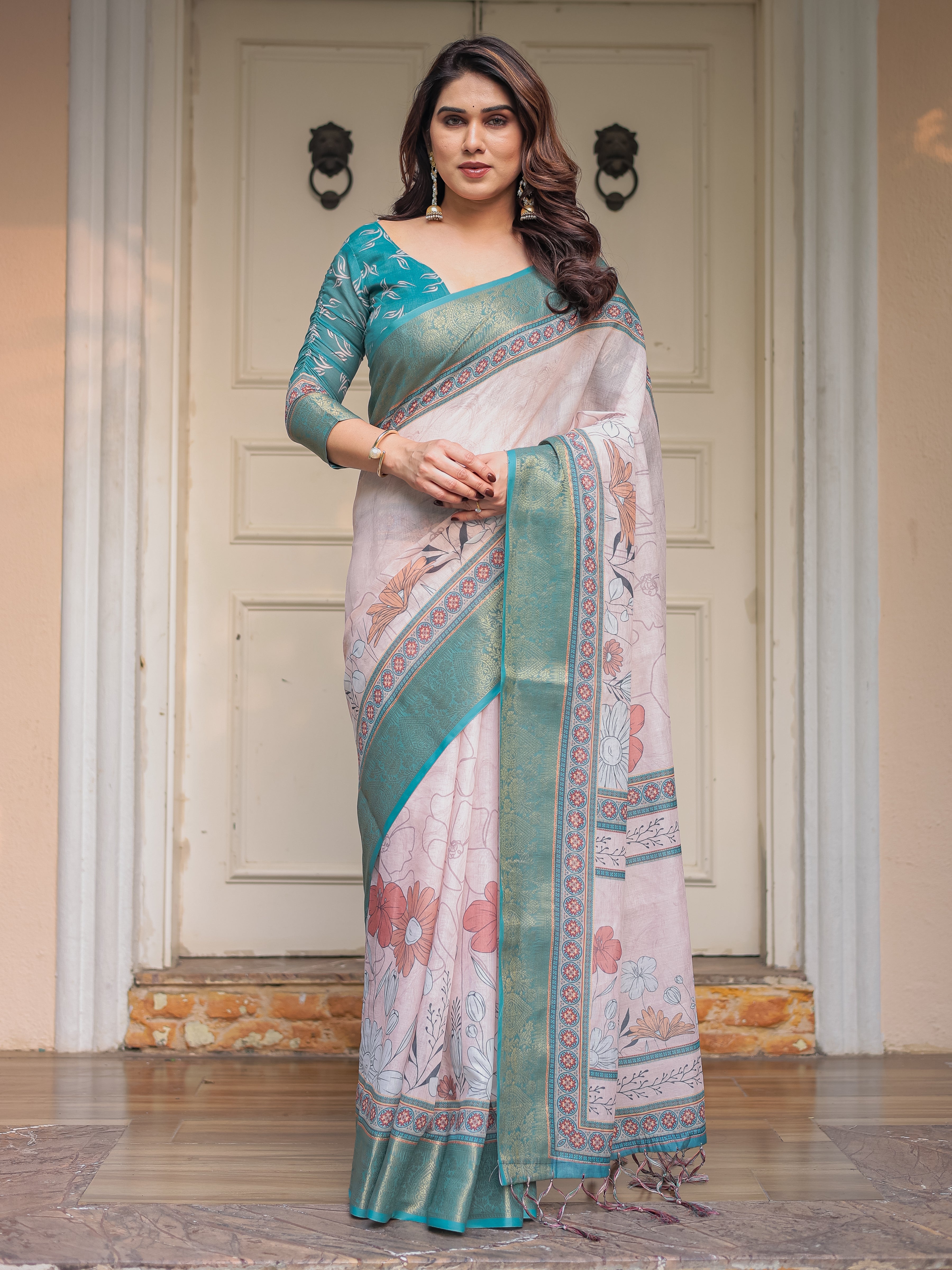 Pastel Lavender Floral Printed Saree with Teal Green Zari Border & Tassels – Elegant Festive Ethnic Wear