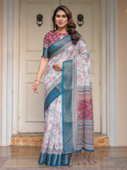 Ivory Floral Printed Saree with Rose Pink & Teal Blue Zari Border & Tassels – Elegant Festive Ethnic Wear