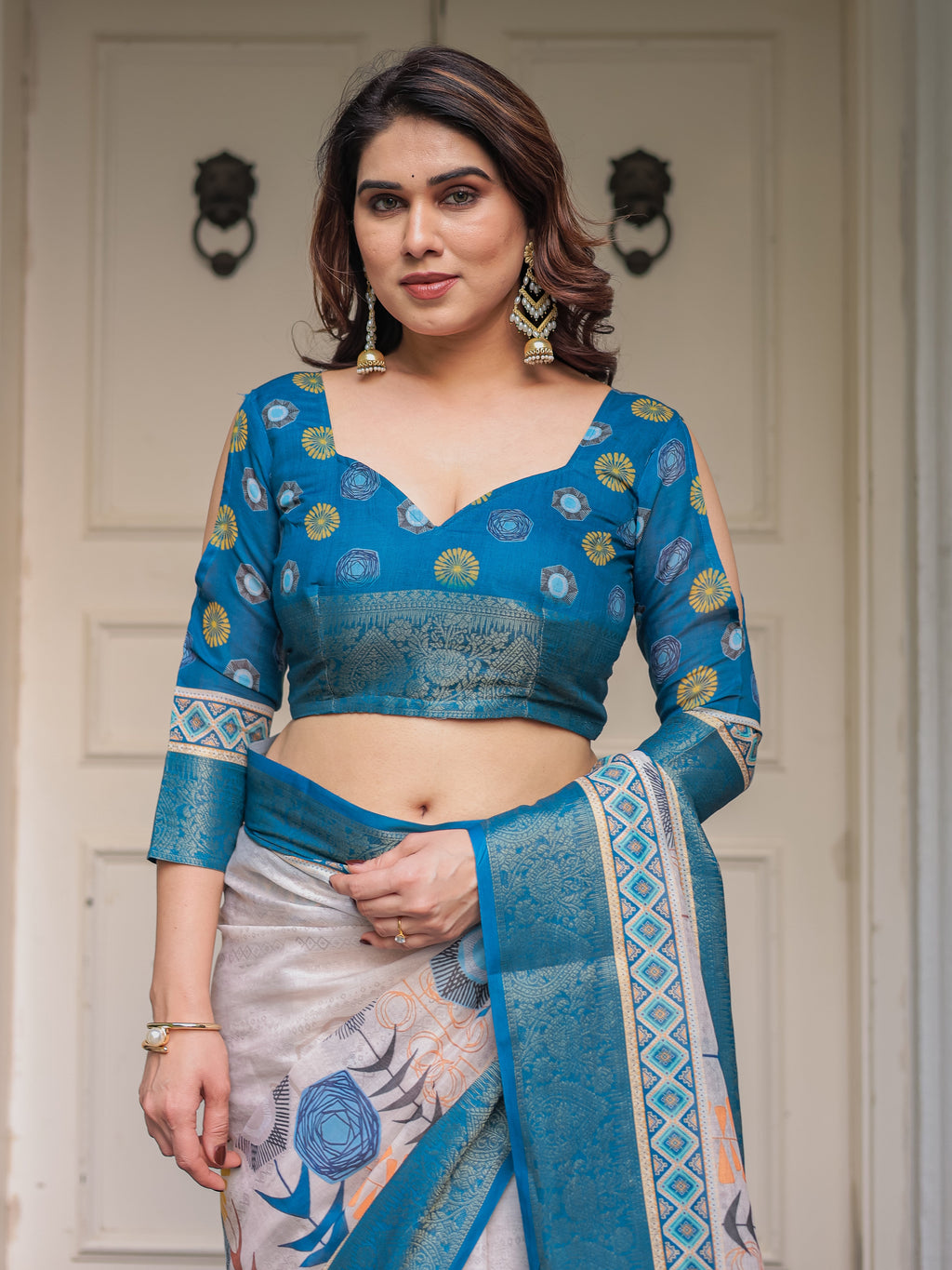 Teal Blue Handloom Cotton Printed Saree with Ethnic Panel Pallu, Woven Border & Tassels – Traditional Festive Wear