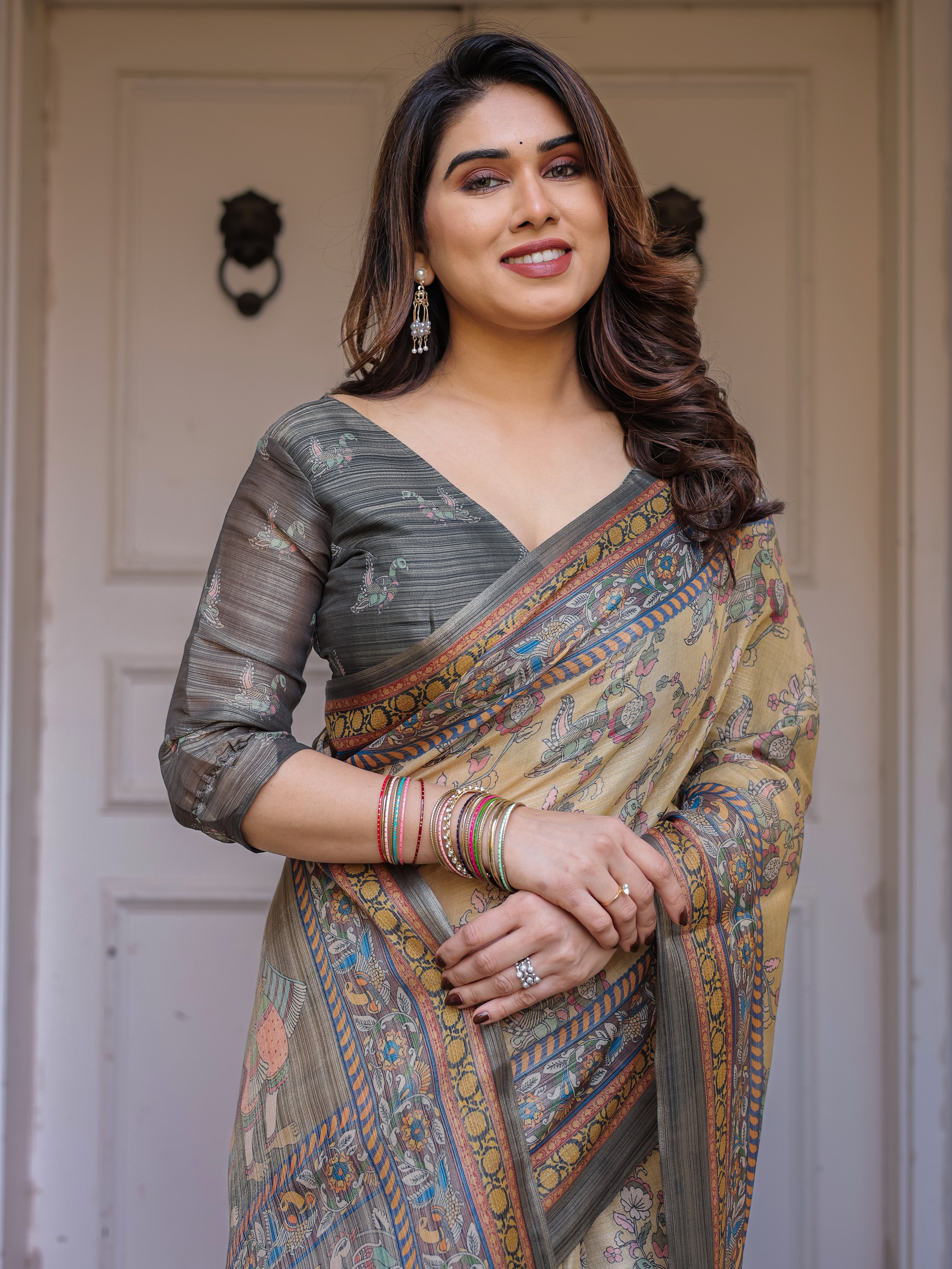 Beige & Olive Green Floral Printed Handloom Cotton Saree with Heritage Panel Pallu, Ornamental Border & Tassels – Elegant Ethnic Wear