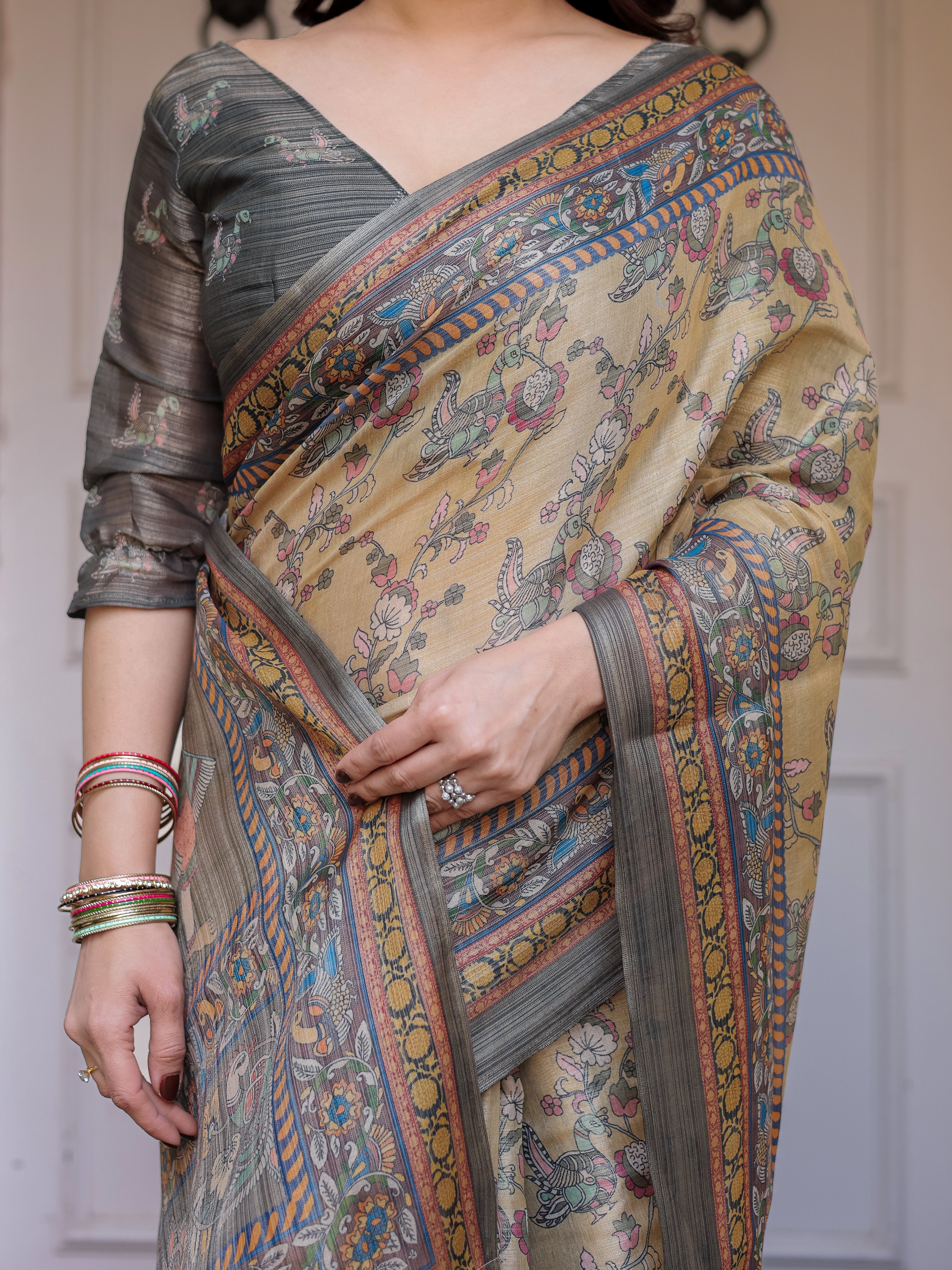 Beige & Olive Green Floral Printed Handloom Cotton Saree with Heritage Panel Pallu, Ornamental Border & Tassels – Elegant Ethnic Wear