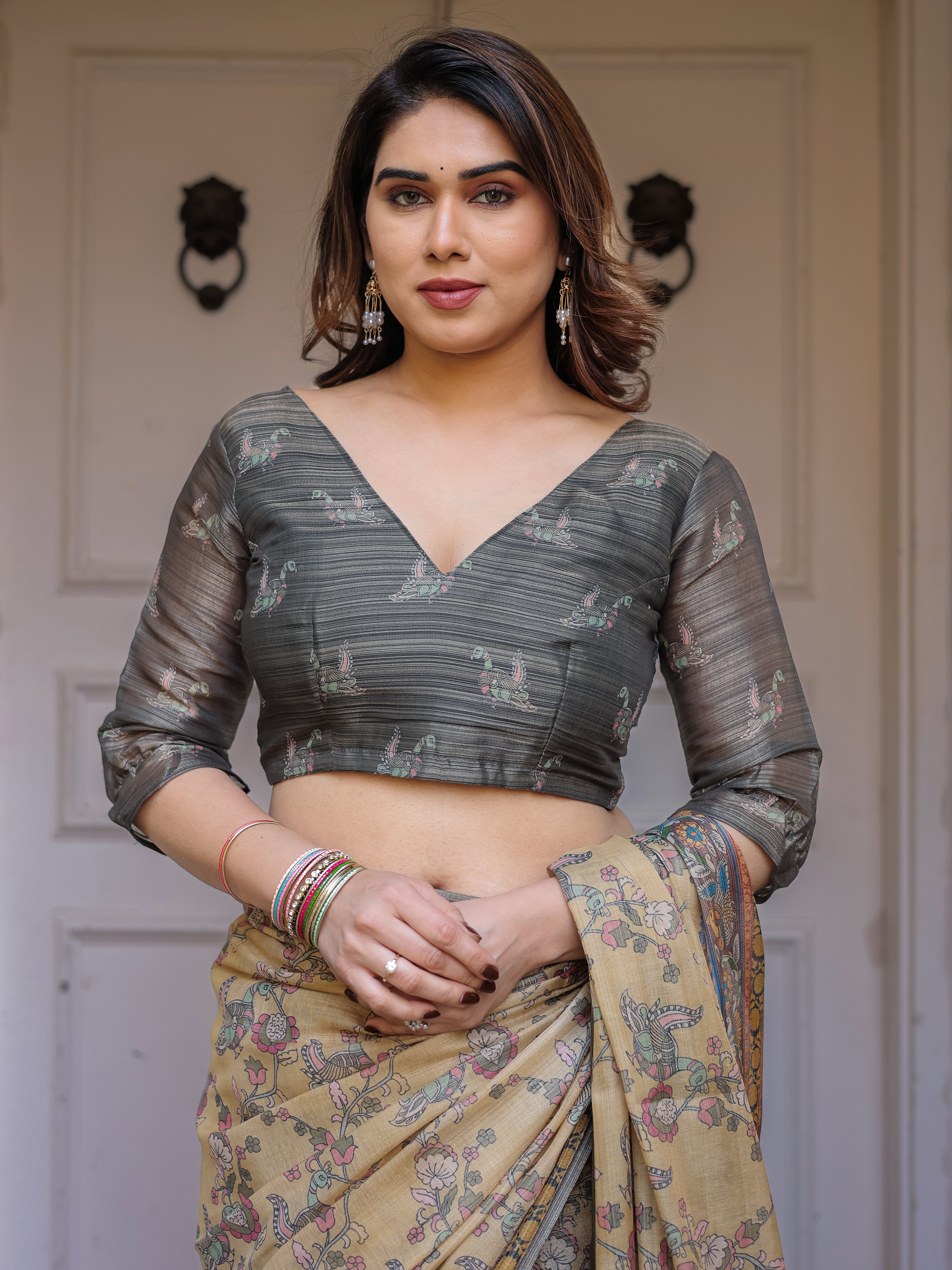 Beige & Olive Green Floral Printed Handloom Cotton Saree with Heritage Panel Pallu, Ornamental Border & Tassels – Elegant Ethnic Wear