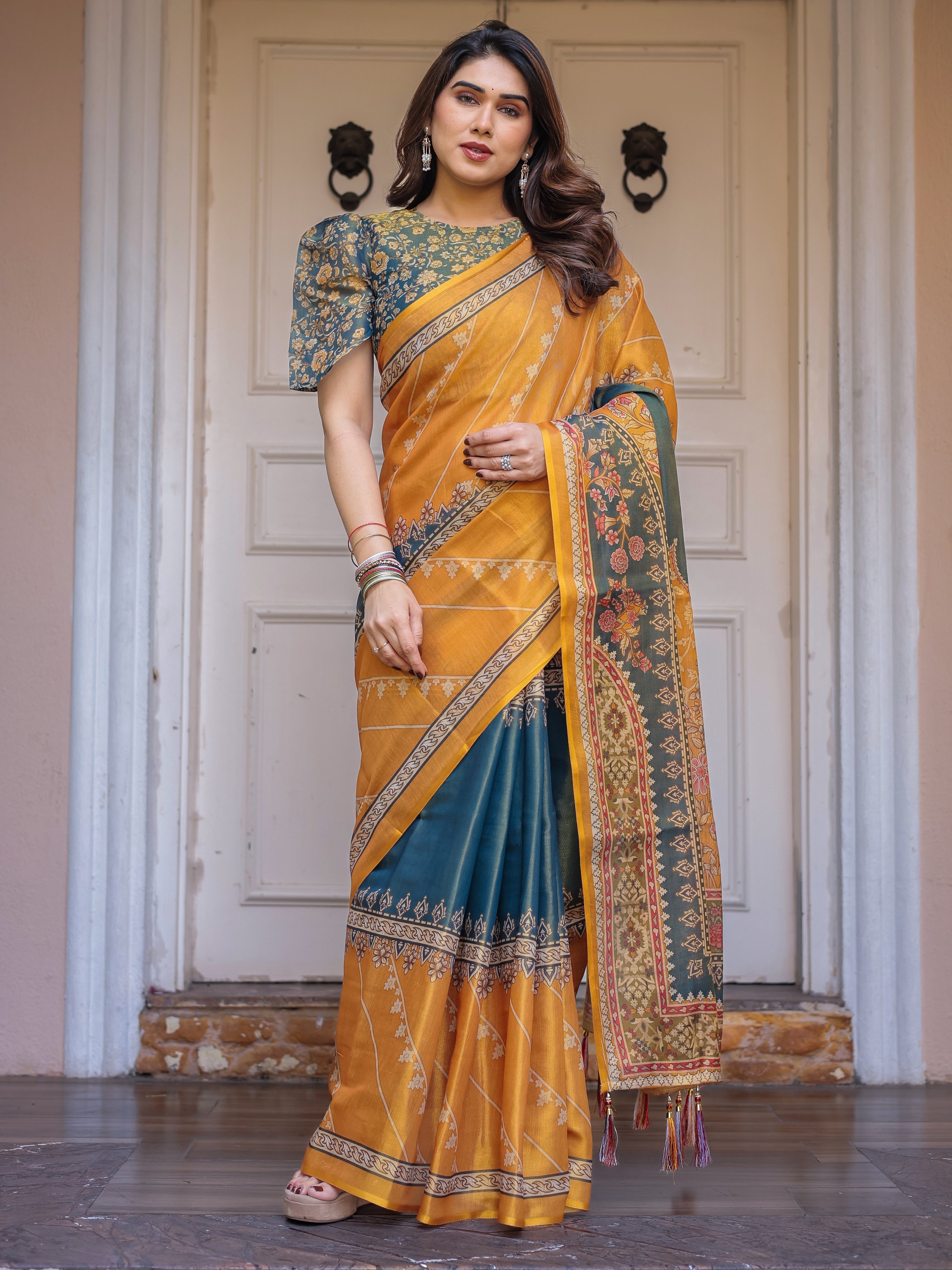 Mustard Yellow & Teal Green Floral Panel Printed Handloom Cotton Saree with Heritage Border & Tassels – Festive Traditional Wear