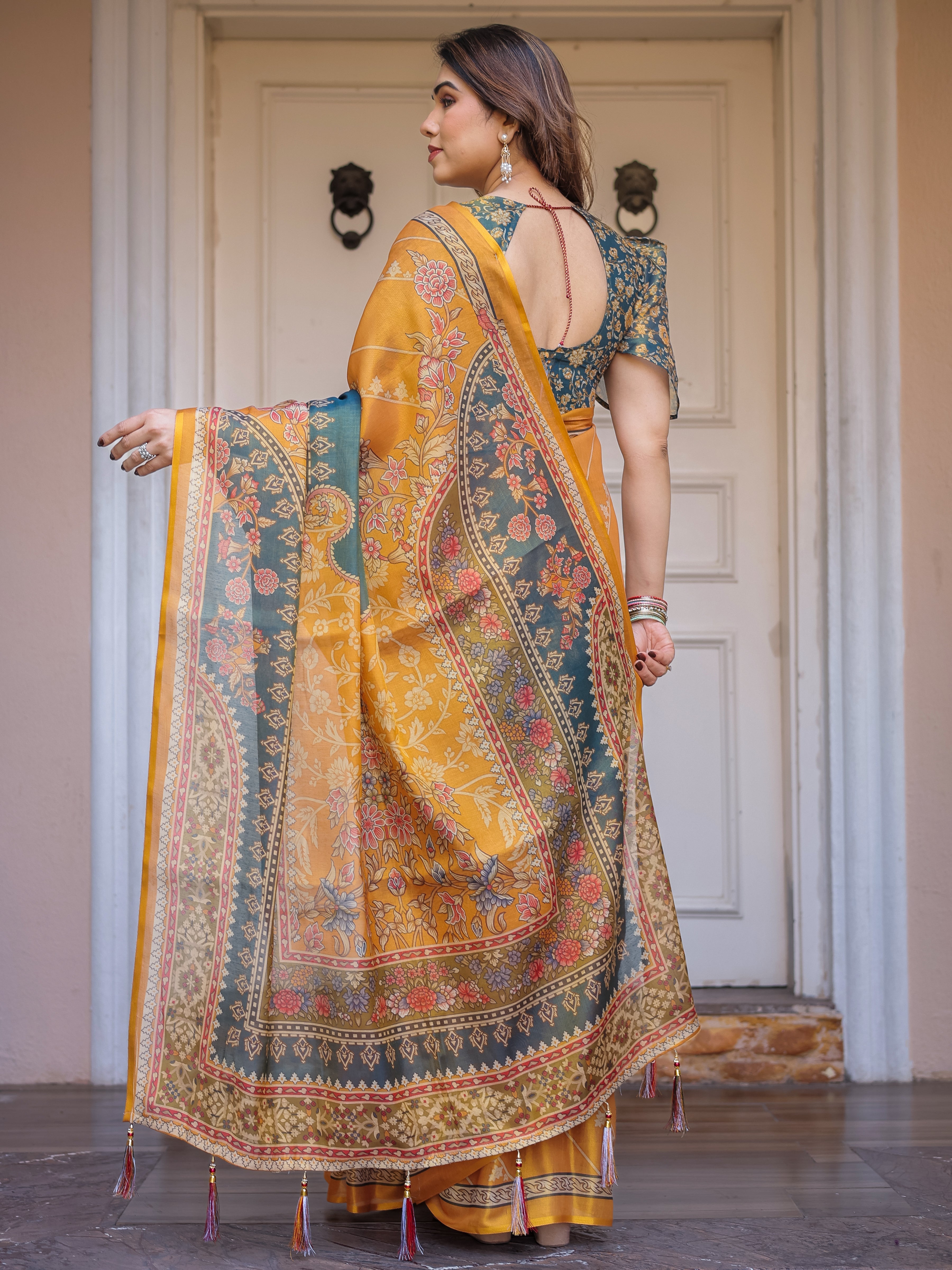 Mustard Yellow & Teal Green Floral Panel Printed Handloom Cotton Saree with Heritage Border & Tassels – Festive Traditional Wear