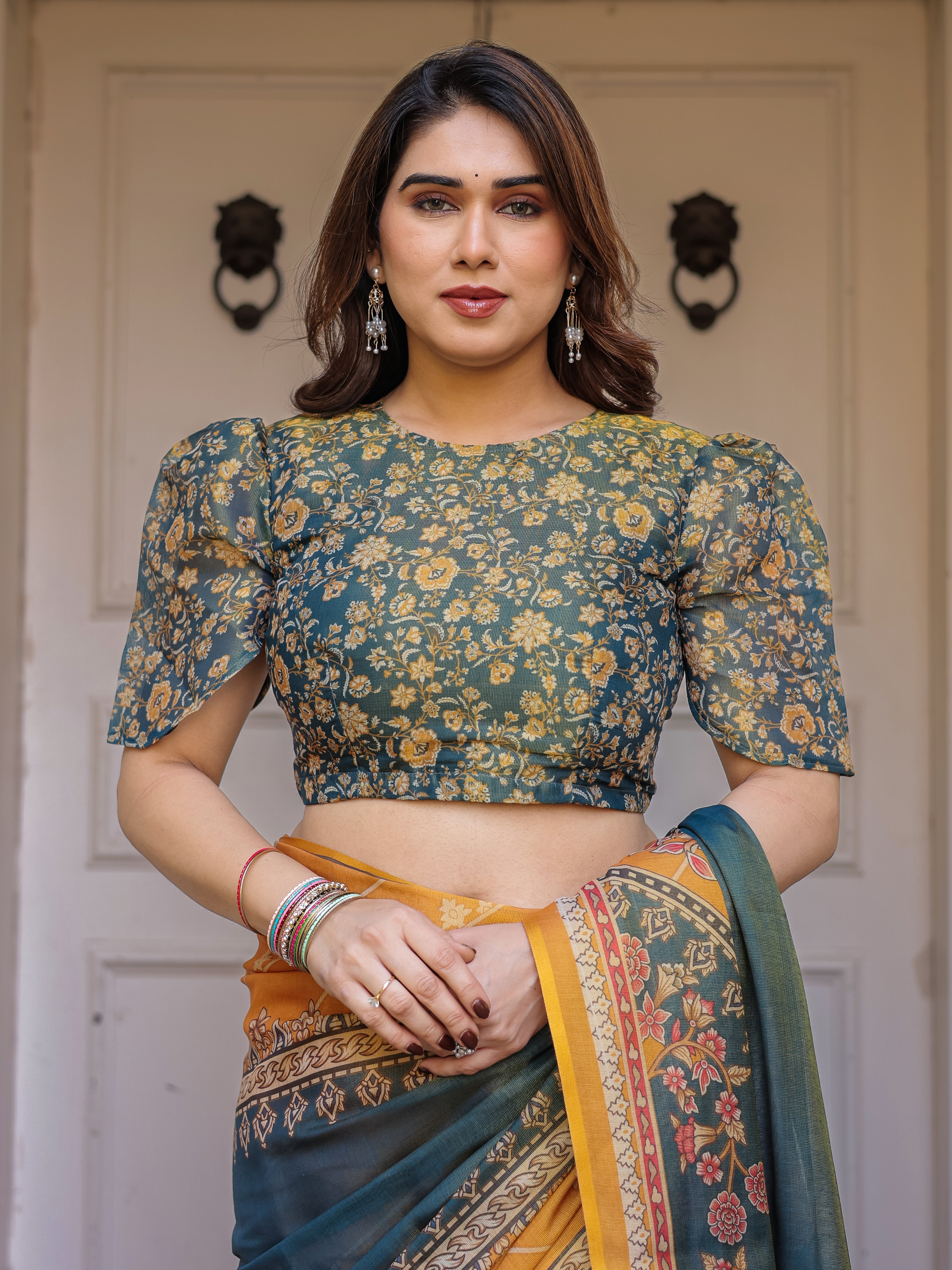 Mustard Yellow & Teal Green Floral Panel Printed Handloom Cotton Saree with Heritage Border & Tassels – Festive Traditional Wear