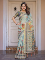 Mint Green Folk Printed Handloom Cotton Saree with Village Scene Panel Pallu, Ornamental Border & Tassels – Traditional Ethnic Wear