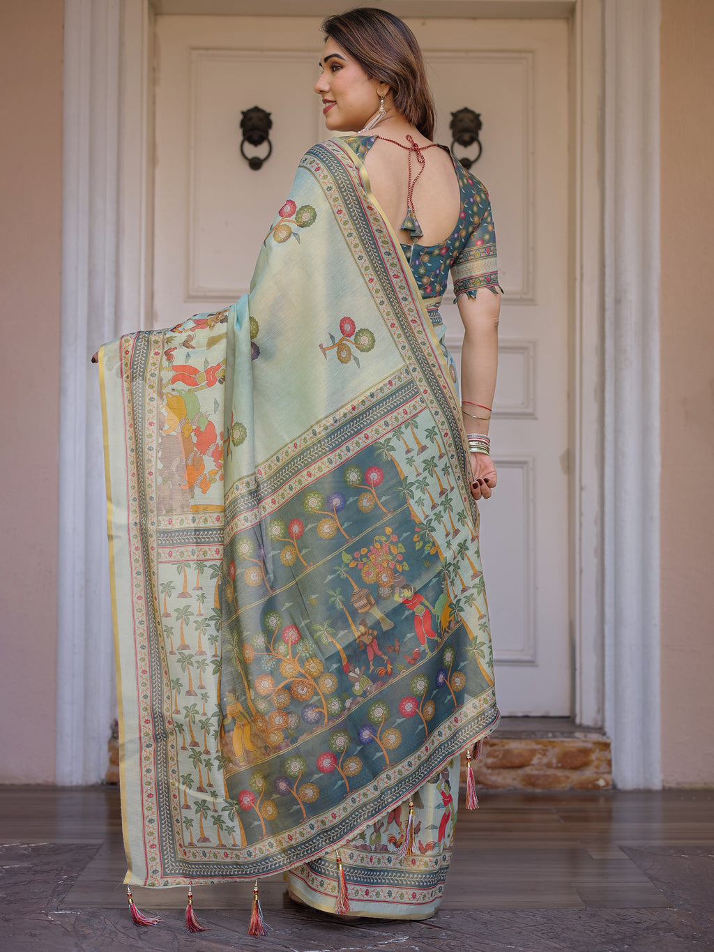 Mint Green Folk Printed Handloom Cotton Saree with Village Scene Panel Pallu, Ornamental Border & Tassels – Traditional Ethnic Wear