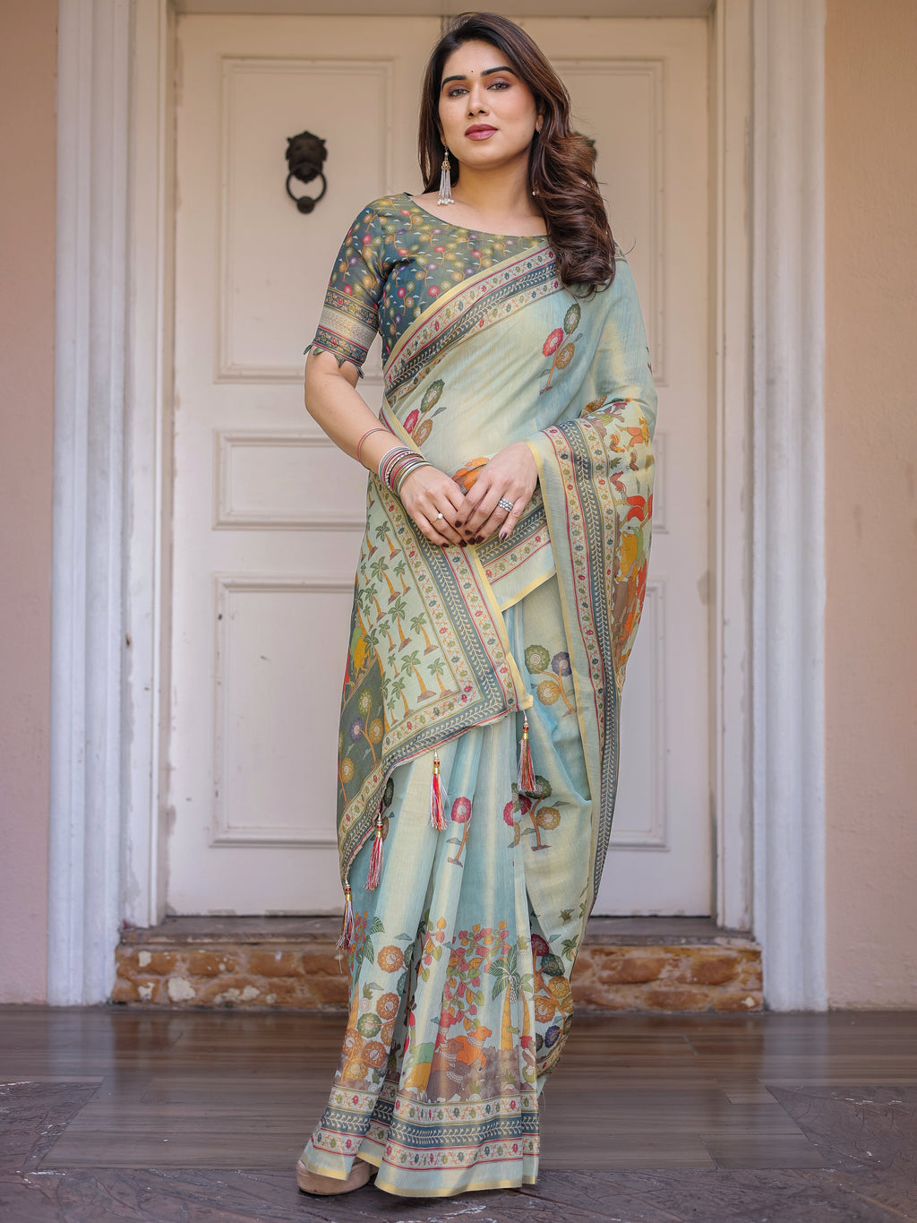 Mint Green Folk Printed Handloom Cotton Saree with Village Scene Panel Pallu, Ornamental Border & Tassels – Traditional Ethnic Wear