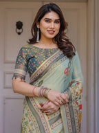 Mint Green Folk Printed Handloom Cotton Saree with Village Scene Panel Pallu, Ornamental Border & Tassels – Traditional Ethnic Wear