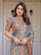 Steel Grey & Rust Gold Floral Handloom Cotton-Linen Saree with Zari Border & Tassels – Elegant Traditional Wear