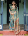 Divine Procession Teal Green Handloom Cotton Saree with Lotus Floral Print & Artistic Pallu