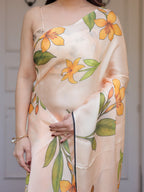 Champagne Peach Satin Georgette Floral Printed Saree with Matching Printed Blouse & Statement Botanical Pallu | Elegant Soft Party Wear Saree