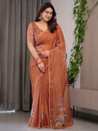 Rust Orange Floral Printed Organza Saree with Multicolour Lace Border | Lightweight Designer Organza Saree with Attached Blouse Piece | Elegant Festive & Party Wear Saree