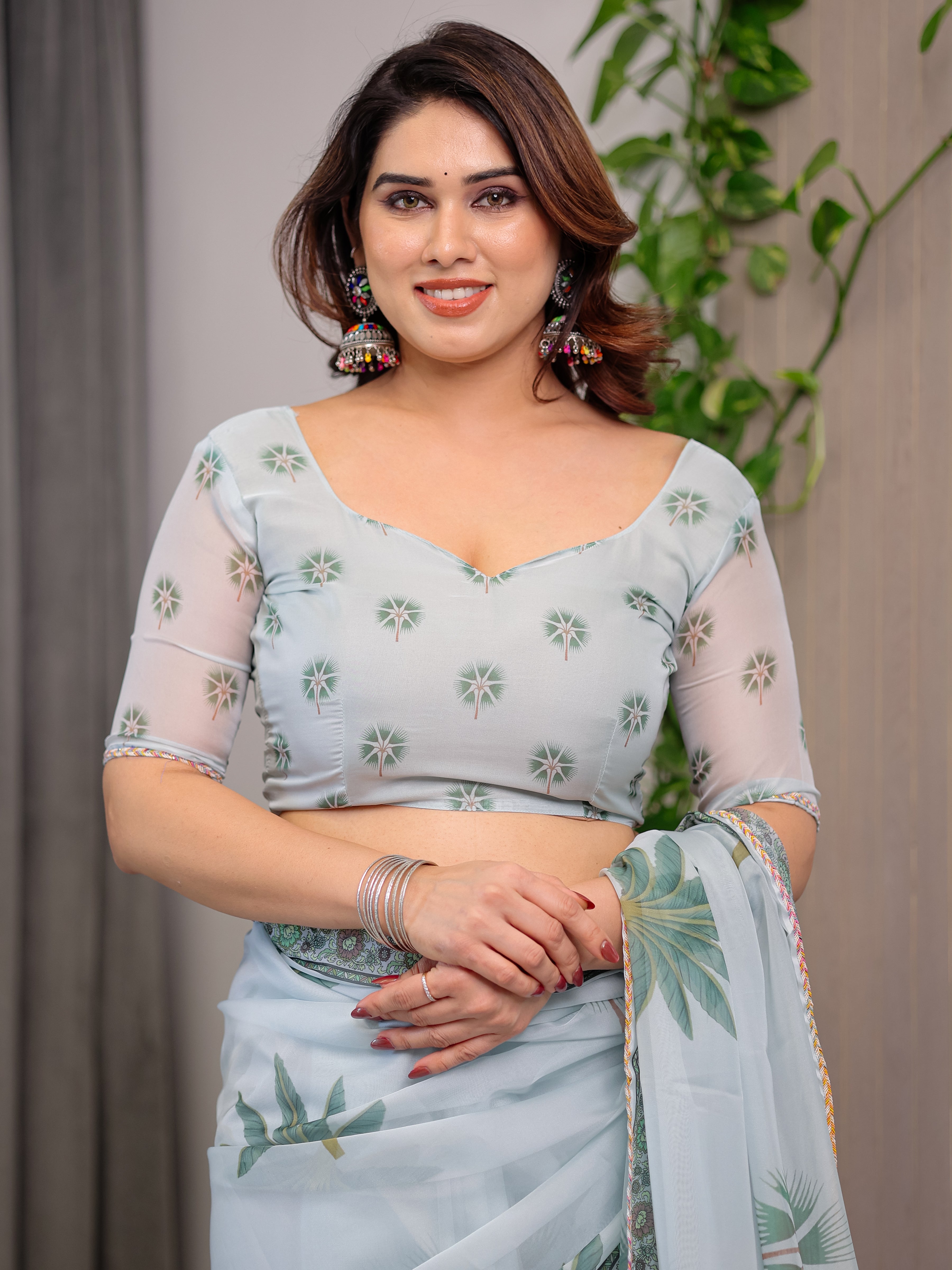 Pastel Mint Green Printed Organza Saree with Tropical Leaf Motifs | Designer Lightweight Sheer Organza Saree with Attached Blouse Piece | Elegant Festive & Day Party Saree