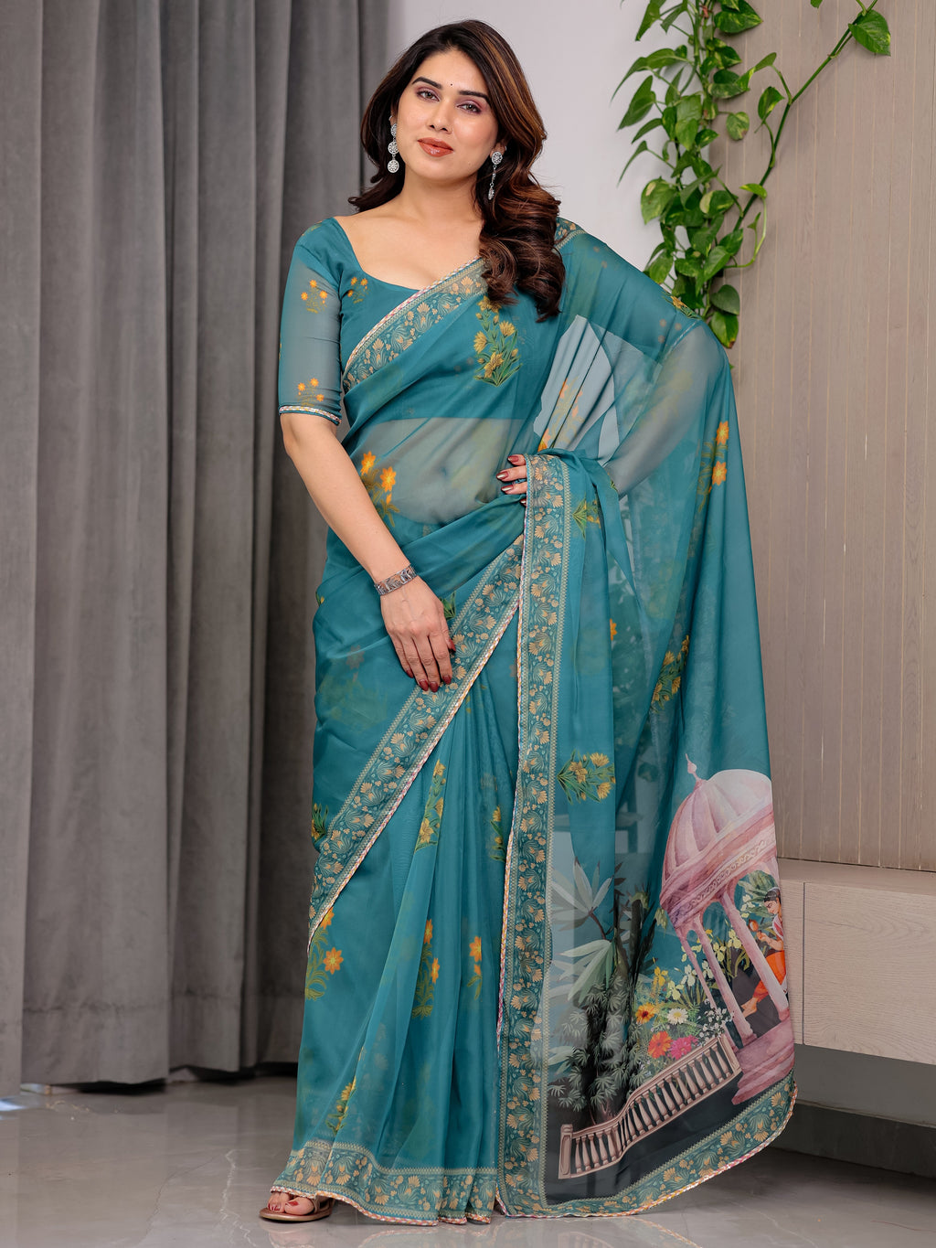 Teal Green Scenic Printed Organza Saree with Garden Pavilion Artwork Pallu | Designer Lightweight Organza Saree with Floral Motifs & Decorative Border | Festive & Party Wear Saree with Blouse Piece