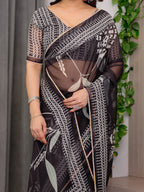 Elegant Black Floral Printed Organza Saree with Intricate Ethnic Border & Multicolour Lace Edges | Lightweight Designer Organza Saree with Attached Blouse Piece | Festive & Party Wear Saree