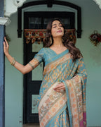 Turquoise Blue Handloom Cotton Saree with Multicolor Floral Pallu & Peach Border