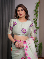 Mint Green Satin Georgette Floral Printed Saree with Attached Blouse – Soft Pastel Designer Saree with Watercolor Bloom Detailing