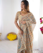 Handloom Linen Cotton Printed Saree with Mythical Animal Art Pallu – Soft Cream with Terracotta & Teal Accents